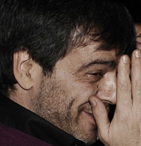 Antonio Iovine appena arrestato... sogghigna.